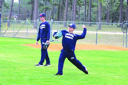 Palatka High product and St. Johns River State College pitcher Layton DeLoach does long toss. (MARK BLUMENTHAL / Palatka Daily News)