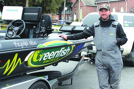 Defending AFTCO Bassmaster Elite at the St. Johns River champion Bryan New shows off his boat after his practice session on Tuesday. (MARK BLUMENTHAL / Palatka Daily News)