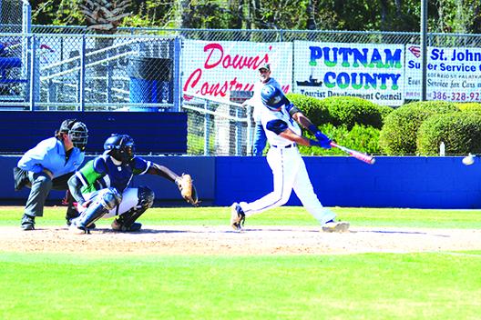 St. Johns River State College’s Ramses Cordova rips a fifth-inning double Friday against Pensacola State. (MARK BLUMENTHAL / Palatka Daily News)