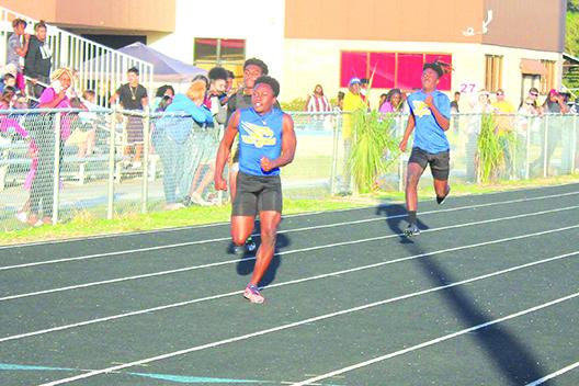 Palatka’s Q’Juan Nelson captures the 100-meter dash during Tuesday's meet at Palatka High School. (MARK BLUMENTHAL / Palatka Daily News)