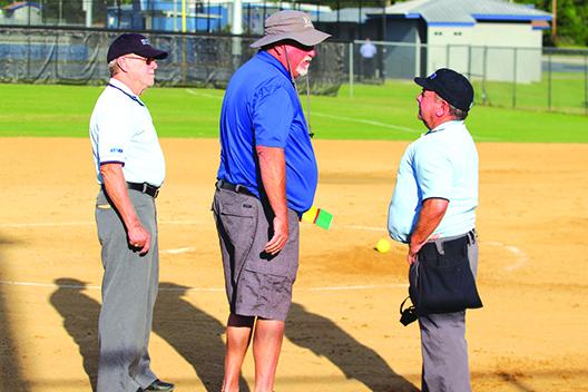 Seen making his case to umpires during a game against Palatka last year, Interlachen head coach Ron Whitehurst will retire from coaching after 20 seasons this spring. (MARK BLUMENTHAL / Palatka Daily News)