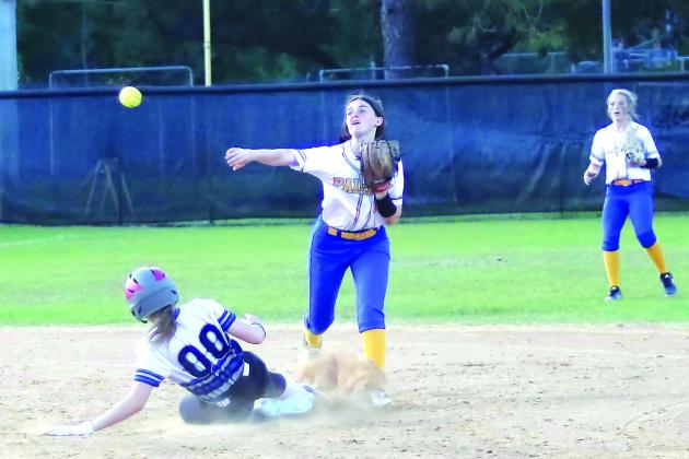 Palatka’s Whitney Seebacher fires to first base to try and complete a fourth-inning double play as Interlachen’s Erin Jacobsen slides in late to try and break the play up. Natali Valdez beat the play at first base. (RITA FULLERTON / Special to the Daily News)