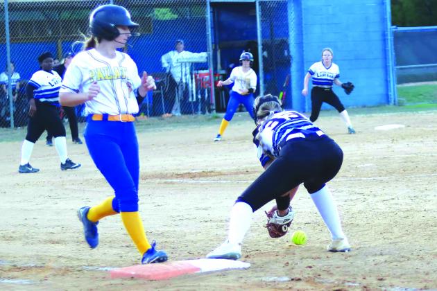 Palatka’s Makenzie Clemons is safe at first base after Interlachen’s Hailee Vickers drops the ball on Clemons’ bunt attempt during the third inning of Friday night’s Putnam County Tournament game, won by the visiting Panthers, 7-1. (RITA FULLERTON / Special to the Daily News)