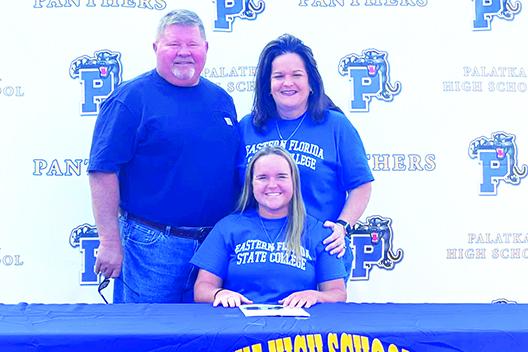 Palatka’s Samantha Clark is all smiles after signing a letter of intent to play at Eastern Florida State last month. Posing with her are father Preston and mother Katrina. (Submitted / Mindi Buckles)