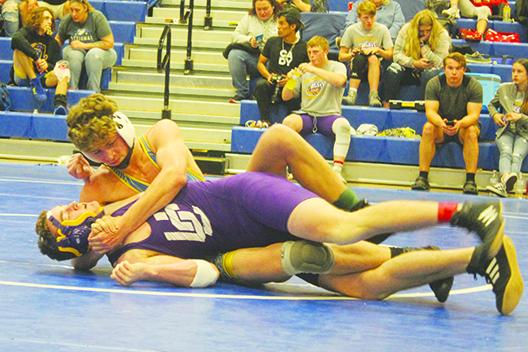 Palatka’s Brandon Lewis is in control in his District 4-1A semifinal match against Union County’s Rodney Barnett in February. Lewis won the match by pin and went on to win the 138-pound district championship. (MARK BLUMENTHAL / Palatka Daily News)
