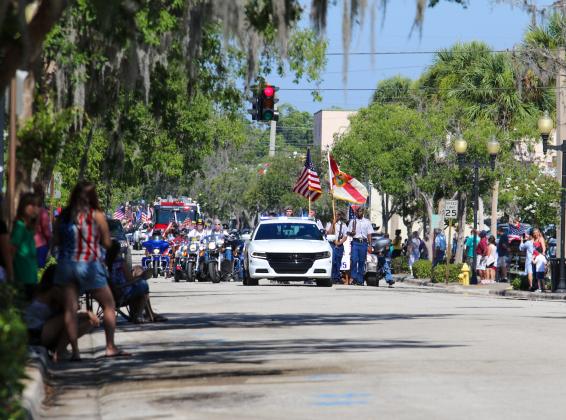 People line St. Johns Avenue as Palatka's Memorial Day parade starts to head down the street. 