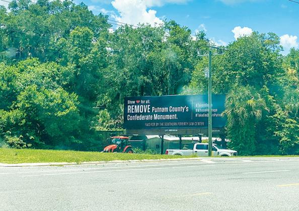 A billboard near the junction of U.S. 17 and State Road 100 in San Mateo is calling for the removal of the Confederate monument that currently sits on the lawn of the Putnam County Courthouse in Palatka.