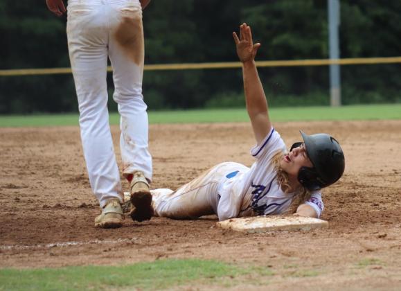 Melrose baserunner Brayden Smyth asks for timeout after diving back into first base after a Gloucester pickoff attempt in the fifth inning Wednesday. (Special to Daily News/ Cindy Barry 