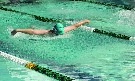 Eleven year old Jackson Young, seen here competing in a butterfly race, won three events this weekend at the meet at Pace Island. (COREY DAVIS/Palatka Daily News)