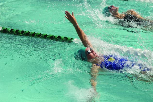 Putnam Sharks swimmer Madelyn Frisvold, seen here competing in the backstroke at a meet at Eagle Harbor, is one of several Sharks being counted on to perform well at the First Coast Summer Swim League championships Friday at Cecil Aquatic Park. (COREY DAVIS/ Palatka Daily News)