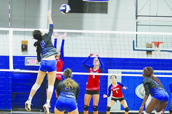 Interlachen’s Brianna Webber (5) goes up for a kill against Florida D&B’s Priscilla Lefors (4) during Tuesday’s home match. (MARK BLUMENTHAL / Palatka Daily News)