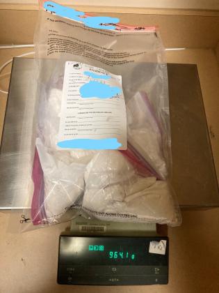 A bag of narcotics seized in a 2021 operation weighs in at almost one kilogram.