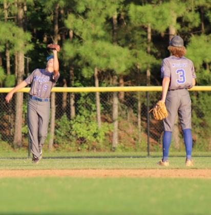 Melrose left fielder Clayton Screen squeezes a first-inning flyball for an out as shortstop Austin Musgrove watches. (Photos by Cindy Barry/ Special to the Daily News)