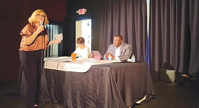Fran Rossano, left, president of the Putnam County Democratic Women’s Club, thanks Robbi Correa, center, and Terrill Hill, candidates for Palatka mayor, for participating in a forum Thursday evening at the Larimer Arts Center in Palatka.
