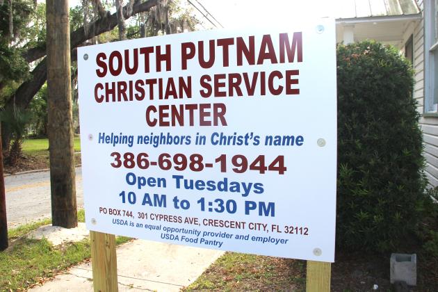 The sign shows the hours of operation for the newly relocated center. –TRISHA MURPHY/Palatka Daily News 