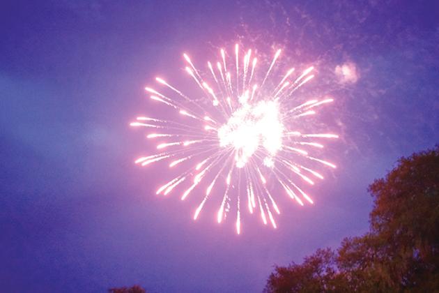 Fireworks explode over Interlachen on Tuesday night in celebration of the Fourth of July.