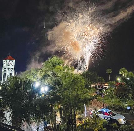 TYLER STARR/Special to the Daily News -- Fireworks explode over the Palatka riverfront Tuesday as the city celebrated the Fourth of July.