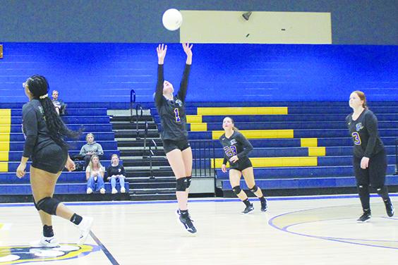 Sydni Spencer, here setting up a kill attempt on Sept. 1 against Peniel Baptist Academy, had 12 service aces, four assists and a kill in the Panthers' straight-set win Thursday against Micanopy Academy. (MARK BLUMENTHAL / Palatka Daily News)
