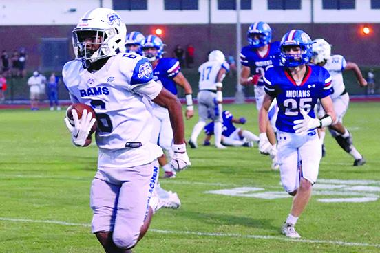 Interlachen’s Raszir Phelps outraces Keystone Heights defender Colton Hollingsworth to the end zone to score on a 65-yard kickoff return during the Rams’ 46-8 loss to the Indians on Sept. 22. (RITA FULLERTON / Special to the Daily News)