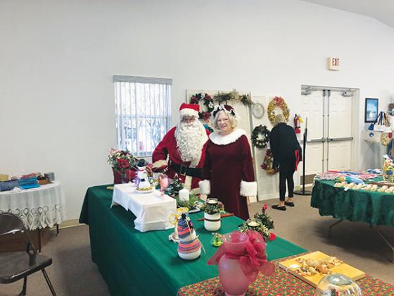 Photo submitted by Kitty Miller – Santa and Mrs. Claus participate in a previous Silver Tea & Christmas Bazaar, which will occur this weekend in Crescent City.