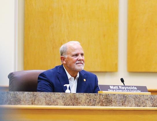 SARAH CAVACINI/Palatka Daily News – State Rep. Bobby Payne, R-Palatka, listens to local officials thank him for his seven years of representing Putnam County in the House of Representatives.