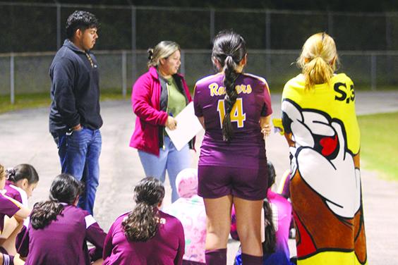 Coach Alicia Baylon (middle) and her Crescent City Junior-Senior High School girls soccer team evened its record at 3-3 on Thursday night with a victory at Deltona. (MARK BLUMENTHAL / Palatka Daily News)