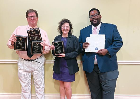 LISA CAVACINI/Special to the Daily News – From left, Daily News Sports Editor Mark Blumenthal, news reporter Sarah Cavacini and Editor Brandon D. Oliver hold the Florida Press Club awards the newspaper received Saturday.