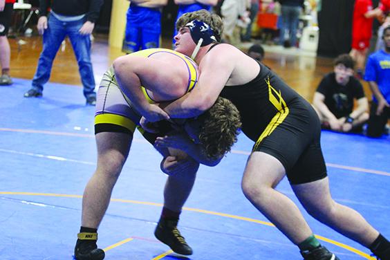 Palatka's Ben Clark (right) looks to take control of Union County's Dylan Lane in the unlimited division of Thursday's District 4-1A championship meet. (MARK BLUMENTHAL / Palatka Daily News)