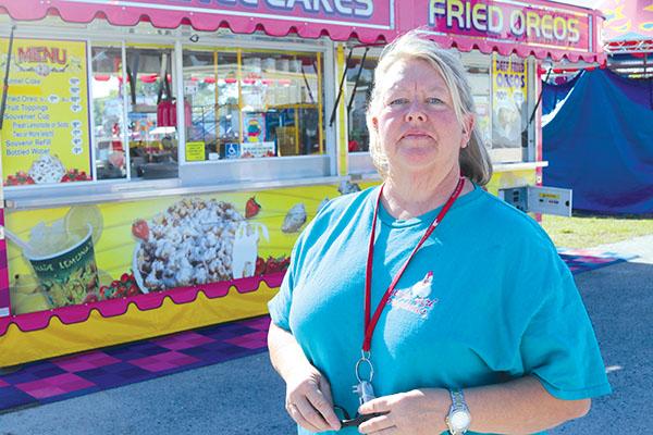 TRISHA MURPHY/Palatka Daily News – Samantha Fairlie, the fairgrounds and rental manager at the Putnam County Fairgrounds, is ready for the gates to open for this year’s fair, which will begin Friday.