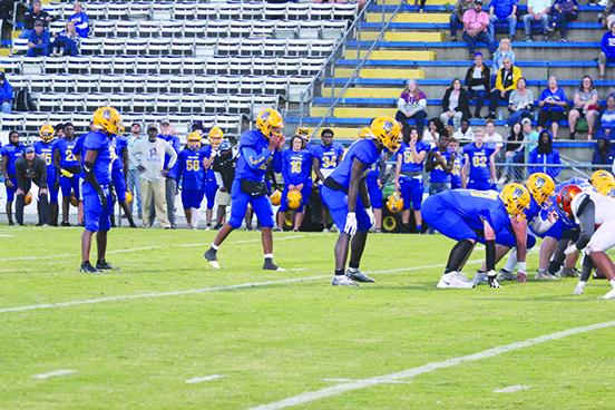Palatka gets ready on defense to make a play against Tocoi Creek at Bennett-Cooper Field at Veterans Memorial Stadium on Oct. 4, 2022. (MARK BLUMENTHAL / Palatka Daily News)