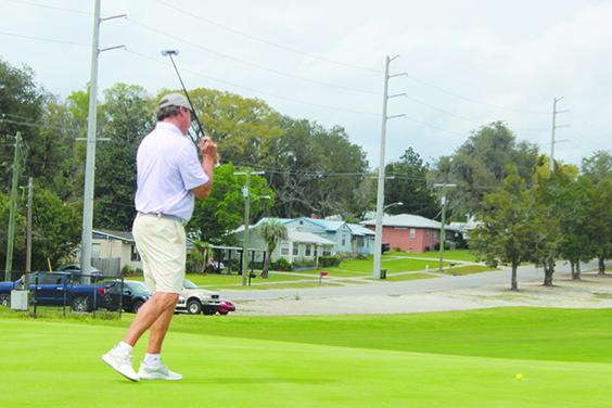 Tim Teaster, who shot a 70 on Friday, reacts to his putt coming up near the lip of the ninth hole at the Palatka Municipal Golf Club. (MARK BLUMENTHAL / Palatka Daily News)