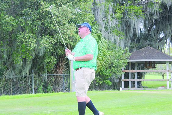 Tony Green, who recorded a 70 during the first round, watches the flight of his tee shot on the sixth hole. (MARK BLUMENTHAL / Palatka Daily News)