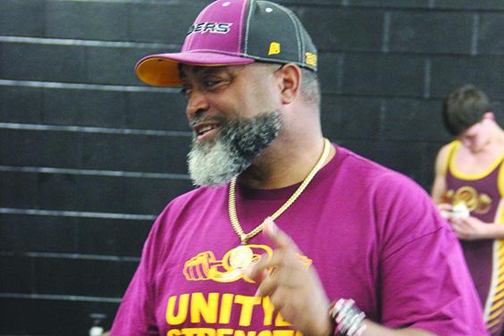 Troy Henry, seen here talking during a meet last week in Interlachen, is in his second year as Crescent City Junior-Senior High School’s boys weightlifting coach. (COREY DAVIS / Palatka Daily News)