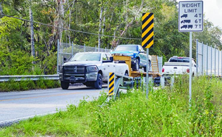 The weight limit for the Etoniah Creek Bridge has been lowered because of concerns of the bridge's integrity.