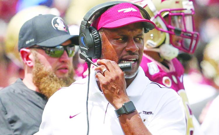 Willie Taggart was 0-5 against rivals Florida, Miami and Clemson. (GREG OYSTER / Special To The Daily News)