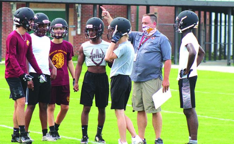 New Crescent City head football coach Sean Delaney provides direction Monday afternoon. (MARK BLUMENTHAL / Palatka Daily News)