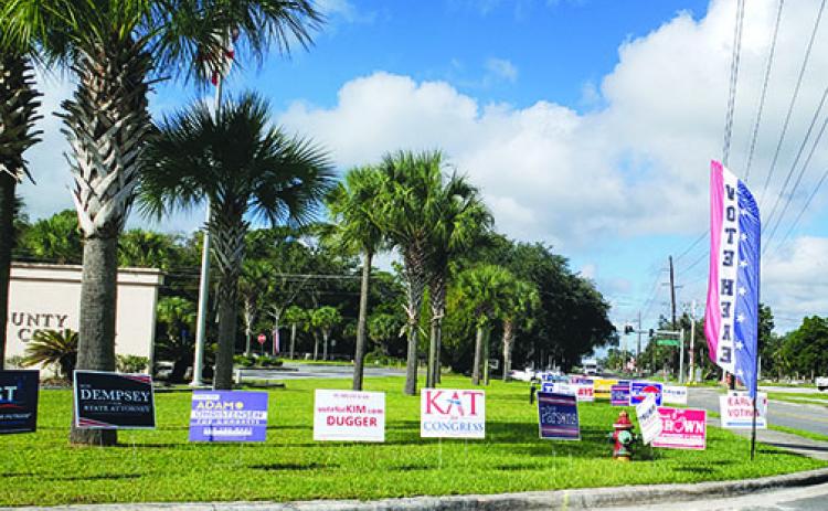 Election signs are displayed along Crill Avenue in front of the Putnam County Government Complex in Palatka on Monday morning.