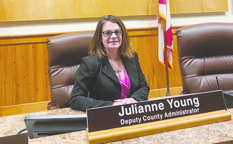 Newly-appointed Deputy County Administrator Julianne Young takes a seat on the Putnam County Board of Commissioners dais at the meeting chambers in Palatka as she reflects on her upbringing in the area and the previous work she’s done with the county before being promoted to her new role.