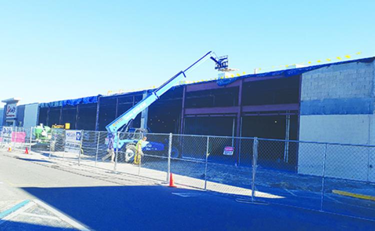 Construction work continues at the former Kmart building in the Town & Country Shopping Center in Palatka that will be home to Marshalls and Five Below, both of which will create dozens of new jobs.