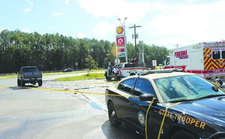 Authorities respond to a pedestrian’s death Friday morning at Circle K, where they said a truck hit a woman near the gas pumps.