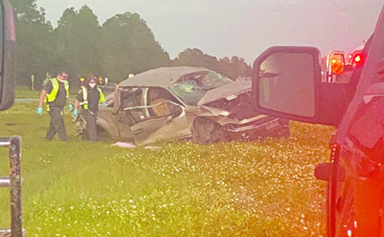 First responders work the scene of a fatal crash Friday in East Palatka, where one teenager died and three others were hospitalized.