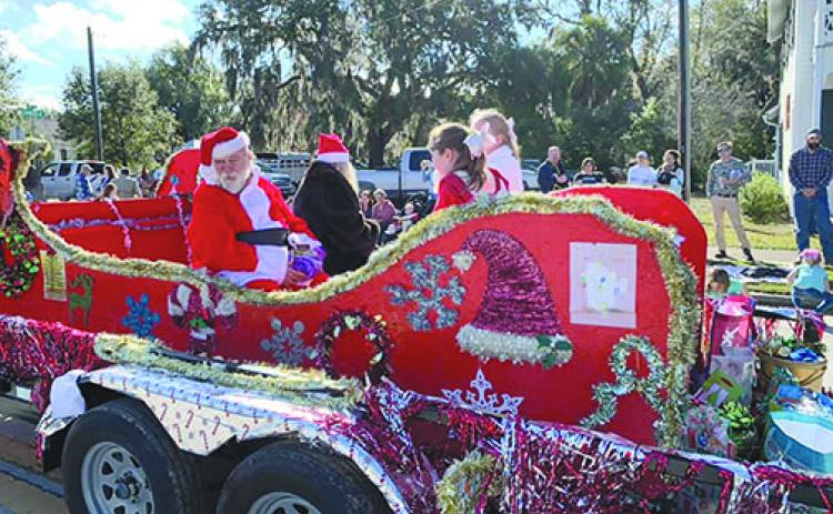 Santa Claus makes an appearance at the 2019 Melrose Christmas Parade to the delight of everyone in attendance. 