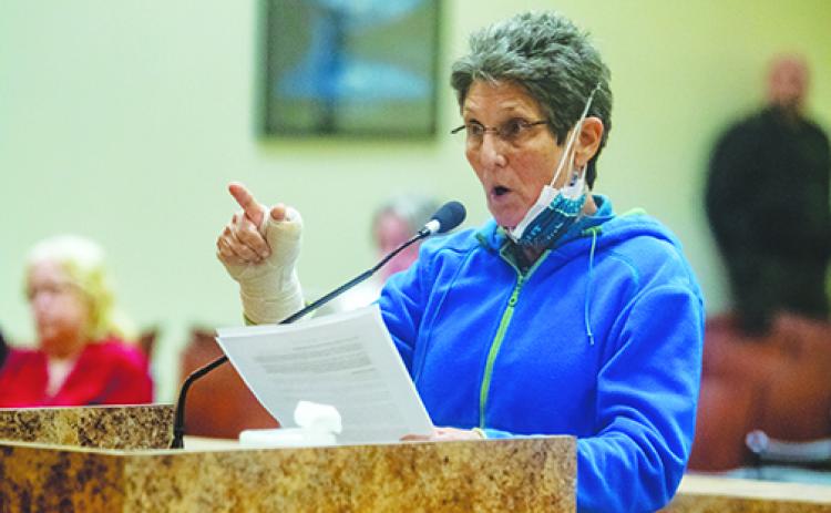 Dr. Julie Thaler tells the board Tuesday about the expletives she heard lobbed at her during a protest Saturday by people who were in favor of keeping the Confederate monument at the courthouse.