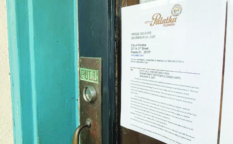 A memo on the door of Palatka City Hall on Thursday afternoon says the building will be closed until Jan. 4 due to a COVID-19 outbreak.
