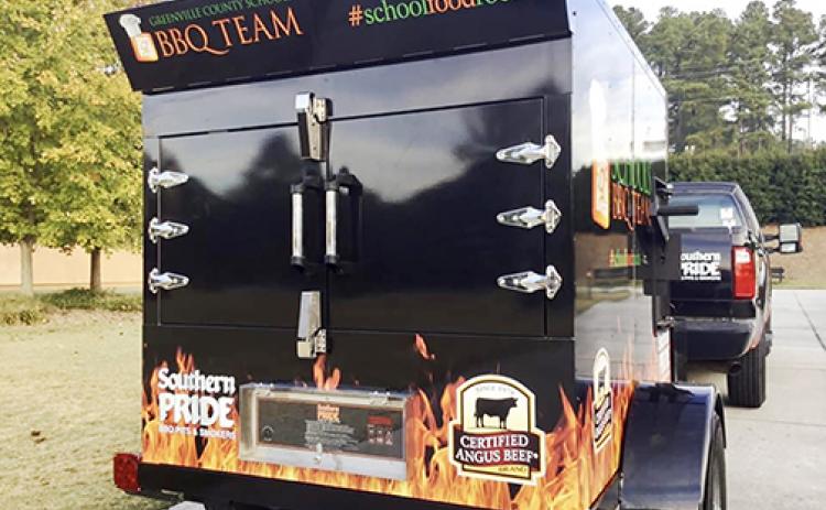 The Putnam County School District is looking to purchase a smoker truck with a grant from nonprofit campaign No Kids Hungry to visit schools with food, similar to this truck from Greenville, South Carolina.