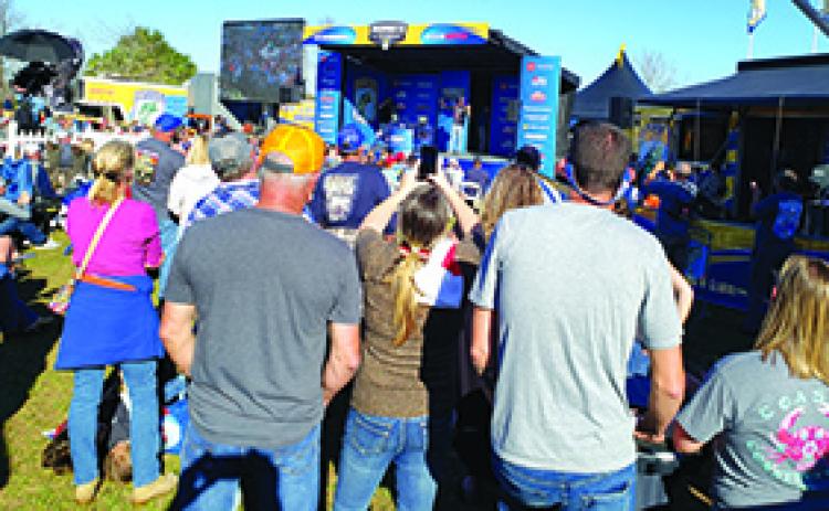 Bass fishing fans gather round at the Palatka docks for the weigh-in on the final day of the 2020 B.A.S.S. Bassmaster Elite Tournament last February. The crowd size will not be the same as last year because of the ongoing COVID-19 virus, but Fox Sports will televise the weigh-ins for those who will not be able to attend the event in person. (WAYNE SMITH / Palatka Daily News)