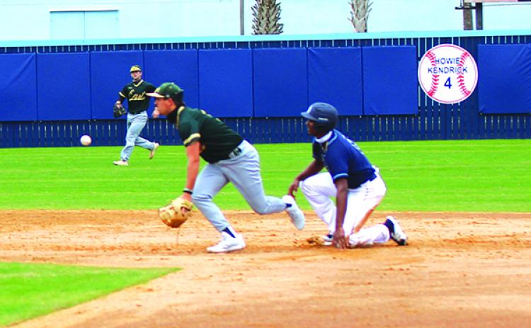 St. Johns River State College’s Juan Jaime steals second base as part of a double steal as East Georgia’s Connor Frost gets in front of the throw during the first game of a doubleheader Sunday at Tindall Field. (MARK BLUMENTHAL / Palatka Daily News)