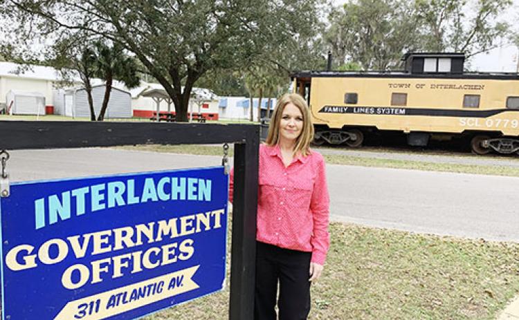 Recently-appointed Interlachen Town Clerk Joni Payne stands in front of Town Hall on Wednesday.