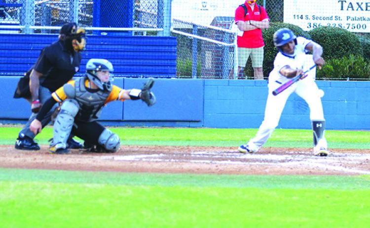 St. Johns River State College’s Juan Jaime lays down a bunt single during the second inning of Thursday night’s game in the Capital City Classic against Pasco-Hernando. (MARK BLUMENTHAL / Palatka Daily News)