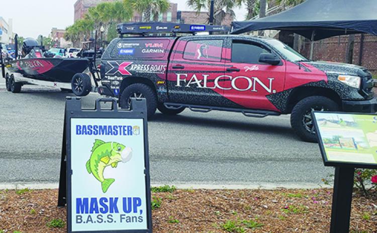 A Bassmaster Elite Series pro leaves the Palatka Riverfront after checking in Wednesday with his boat for the tournament, which begins today. Bassmaster has taken several precautions against COVID-19, including asking fans to mask up.